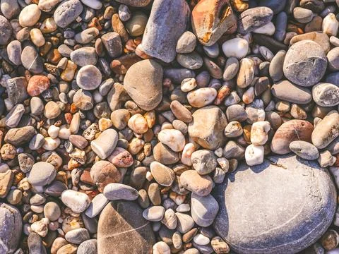 Stones on the beach,Pebbles as abstract background Stock Photos