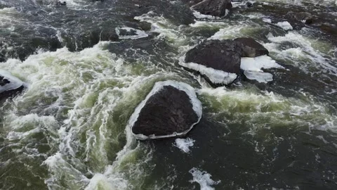 Stones Covered with Ice in the Threshold. Cold Torrential Stream Stock Footage 233285454