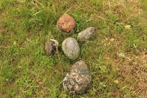 Stones on the ground in the form of a human figure Stock Photos