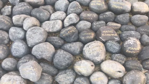 Stones with Names on them Stock Footage 100237656