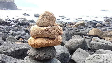 Stones piled up on the beach. wave background Stock Footage 279437157