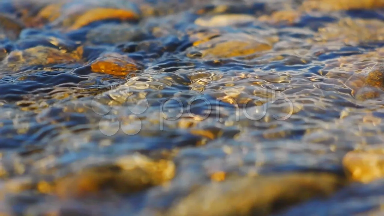Stones in river Nature background | Stock Video | Pond5