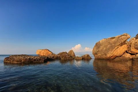 Stones in sea Stock Photos