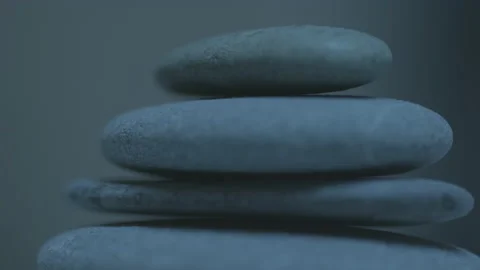 Stones spin in cool light on macro lens Stock Footage 130361626