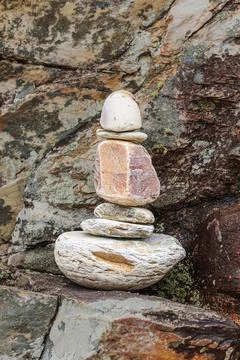 Stones stacked in a phallic shape. Stock Photos