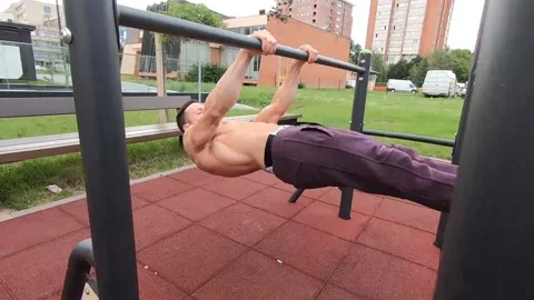 Stong muscle guy workout dragon flag exercise Video stock 137801043