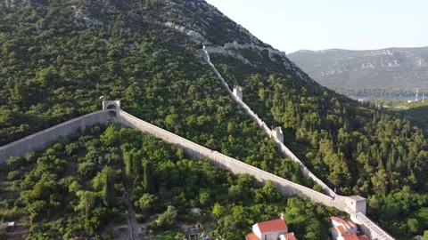 Ston's Eastern Echo: 4K Drone View of Historic Walls Resembling the Great Wal Stock Footage 246611345