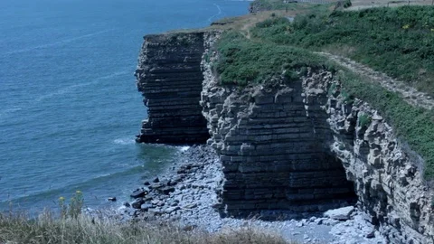 A Stony Beach and Cliff With a View of the sea Stock-Footage 91898243