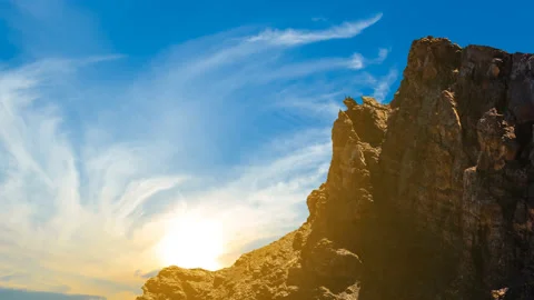 Stony mountain chain at the sunset, dramatic travel background time lapse scene Stock Footage 239744221