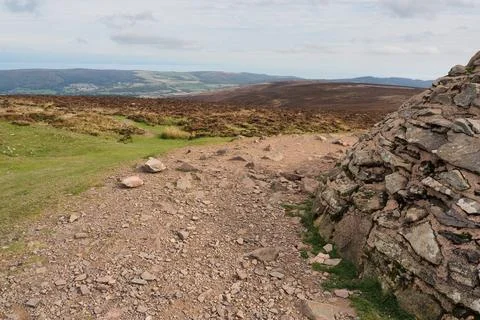 Stony path and cairn on Dunkery Beacon summit view, Somerset Stock Photos