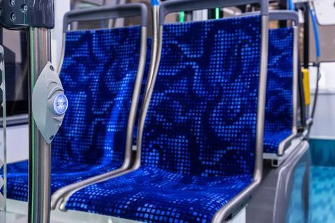 Stop button modern and comfortable interior of the city bus Stock Photos
