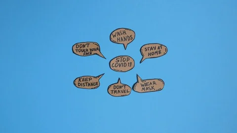 Stop COVID 19 cartoon speech bubbles on the blue background Stock Footage 130128761