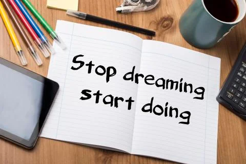 Stop dreaming start doing - Note Pad With Text Stock Photos
