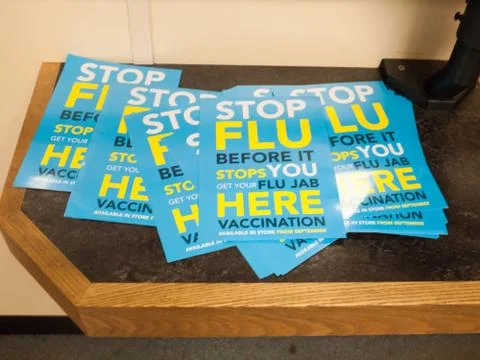 Stop flu before it stops you hand outs on counter Stock Photos