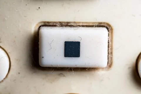 Stop icon and button close up of a old Television remote controller 스톡 사진