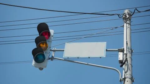 Stop light and Traffic light at intersection in city of japan. Stock Photos