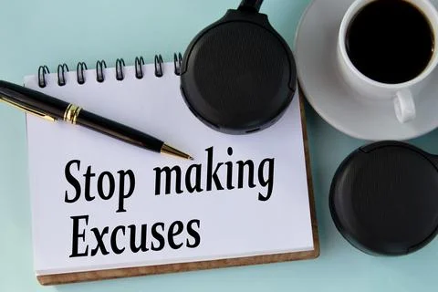 STOP MAKING EXCUSES - words in a white notepad on a light background with a.. Stock Photos