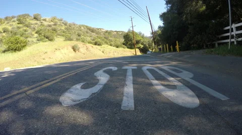 STOP Message on a Rural Road Stock Footage 48832143