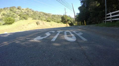 STOP Message on a Rural Road Stock Footage 48832881