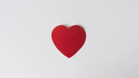 Stop motion animated crumpling and disappearing paper red heart Stock-Footage 124415039