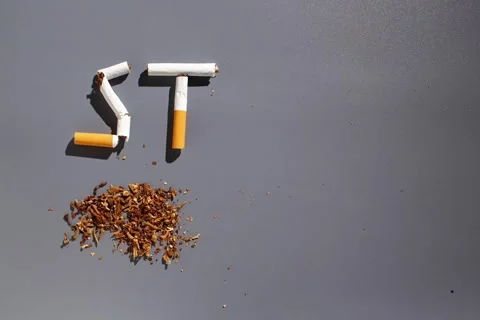 Stop motion animation with appearing and disappearing word STOP made of cigar Stock Footage 289204994