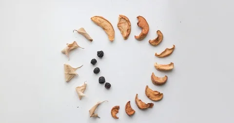 Stop motion animation of appearing leaves and berries forming a heart shape. Stock Footage 80756985