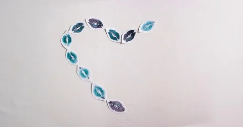 Stop motion animation of blue lips on paper forming heart. Valentine's day. Stock Footage 80757085