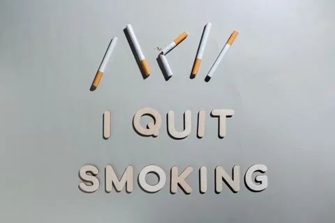 Stop motion animation with broken cigarettes on grey background Stock Footage 288437820