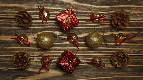 Stop motion animation. Christmas tree toys with a snake move on a wooden back Stock Footage 143003041