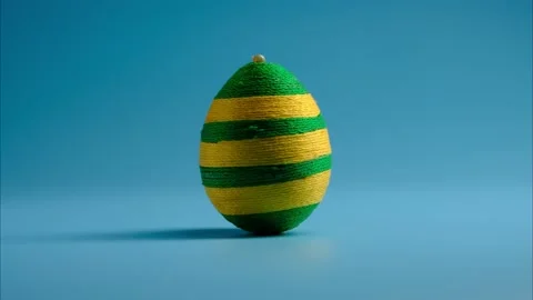Stop motion animation of colorful easter egg made from threads Stock Footage 166779707