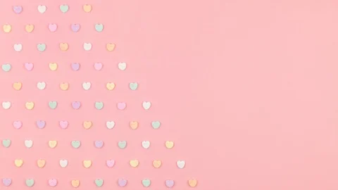 Stop Motion Animation Conversation Candy Hearts Cover Pink Pastel Background Stock Footage