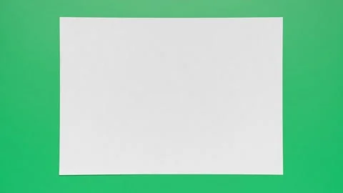 Stop motion animation of crumpled paper on a green and yellow background. Stock Footage 304963252
