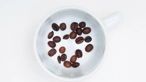 Stop motion animation of cup of coffee made from beans Stock Footage 136764343