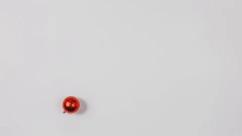 Stop motion animation, different Christmas decorations gather in the middle of t Stock Footage 128163961