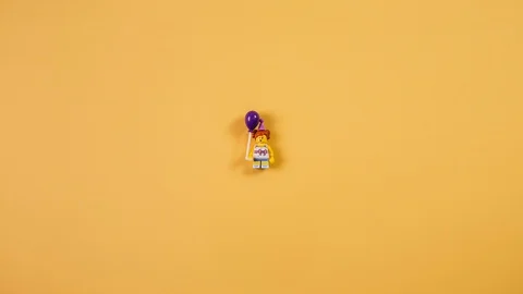 Stop motion animation, different objects gather and form a heart symbol and a sl Stock Footage 128163956