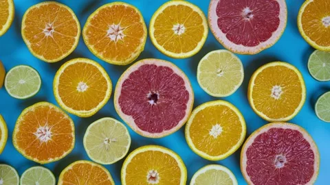 Stop motion animation fruit citrus on colored background Stock Footage 142205098