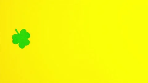 Stop motion animation of green paper clover Stock Footage 148241228