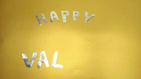 Stop motion animation with letters folding into the inscription Happy Valentine. Stock-Footage 146223771