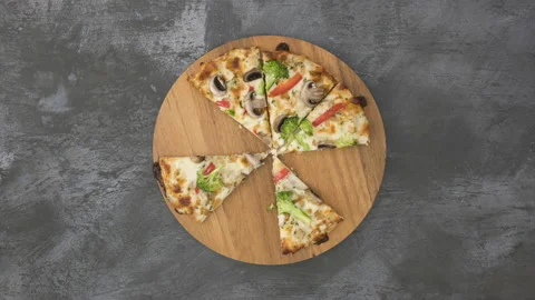 Stop Motion Animation Loop of Eating a Vegetarian Pizza with Room for Copy Stock Footage 150807814