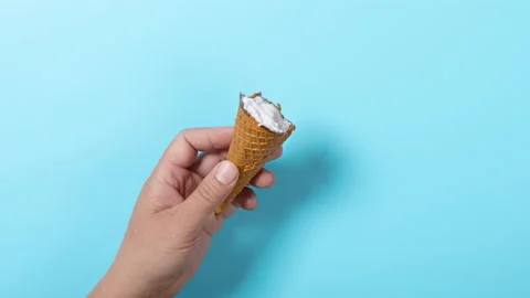 Stop motion animation of man eating ice cream cones Stock Footage 201676141
