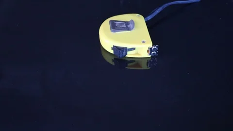 Stop motion animation of measurement tool , black screen Stock Footage 107151116
