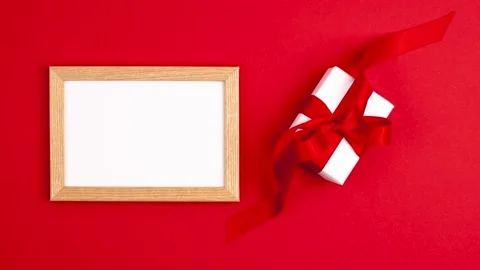 Stop motion animation of mockup white frame flat lay of white gift box Stock Footage 149789895