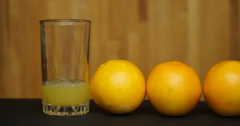 Stop motion animation orange and juice. Video stock 99318951