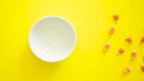 Stop Motion Animation of Orange and Yellow Candy Corn Background Stock Footage 137972092