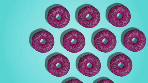 Stop motion animation of pink glazed donuts appearing on blue background Stock Footage 195985113