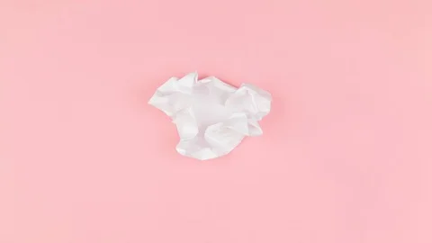 Stop Motion Animation of Plain, Blank White Sheet of Paper Uncrumpling - Looping Stock Footage