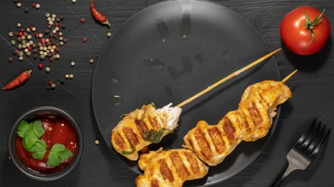 Stop motion animation. The process of eating cooked shish kebab, which lies Video stock 233740874