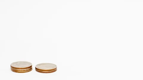 Stop motion animation Raising of coins stacks on White background Stock Footage 92915359