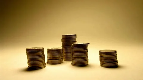 Stop motion animation Raising of coins stacks background and coin into a clear Video stock 334028556