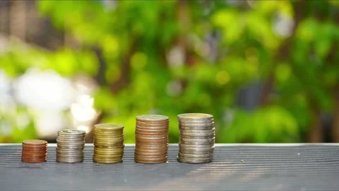 Stop motion animation Raising of thai baht coins stacks Stock Footage 148753568